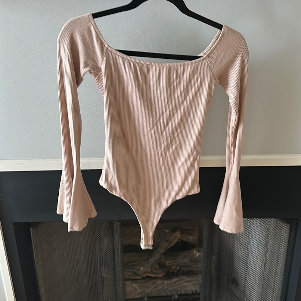 Revolve light pink bodysuit with bells sleeves